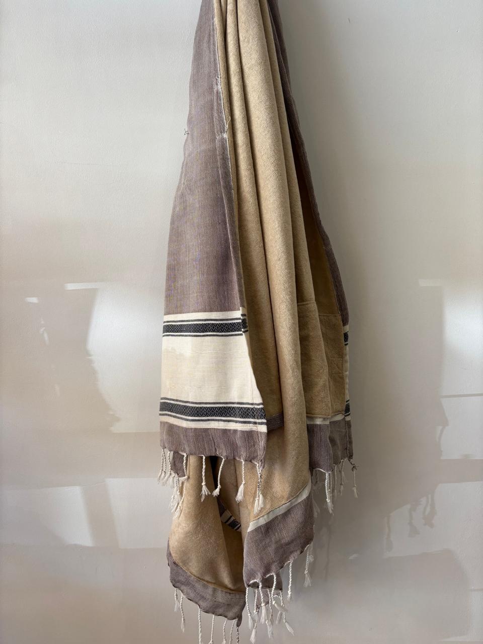 HANDWOVEN KIKOY TOWEL IN TAUP ON CARAMEL